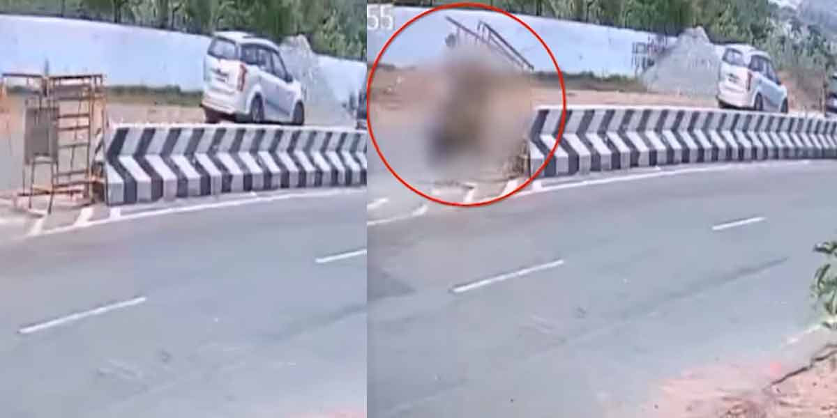 A two-wheeler collided with a barricade; CCTV display output