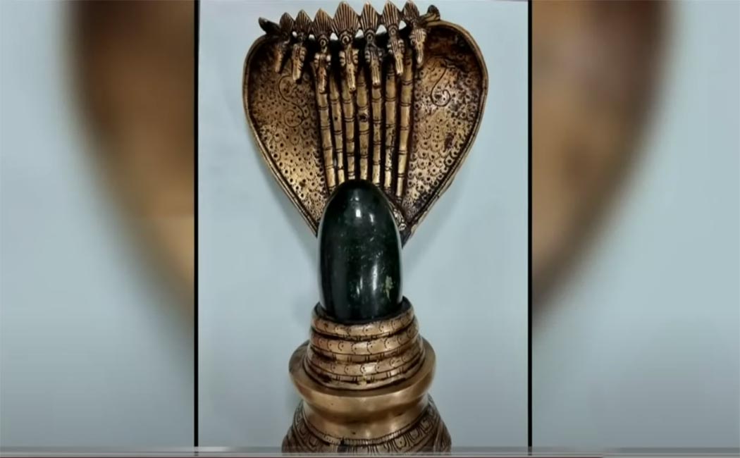 Confiscation of ancient greenstone lingam; Two arrested!