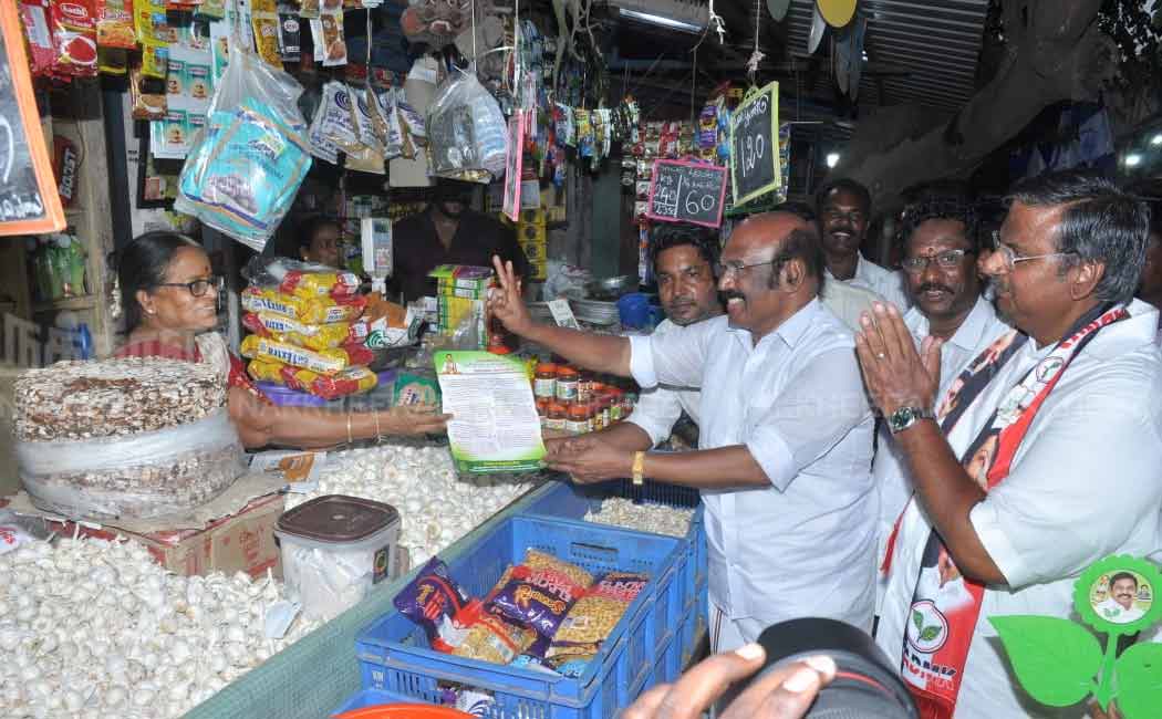 Jayakumar gathers votes by sewing clothes and supporting ADMK candidate (Pictures)
