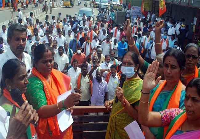 BJP workers protest to reduce taxes on petrol and diesel