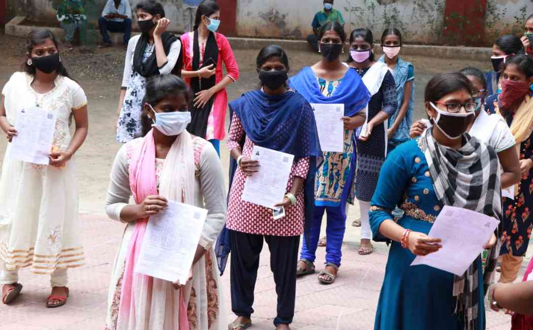 12th students receiving temproray marksheet