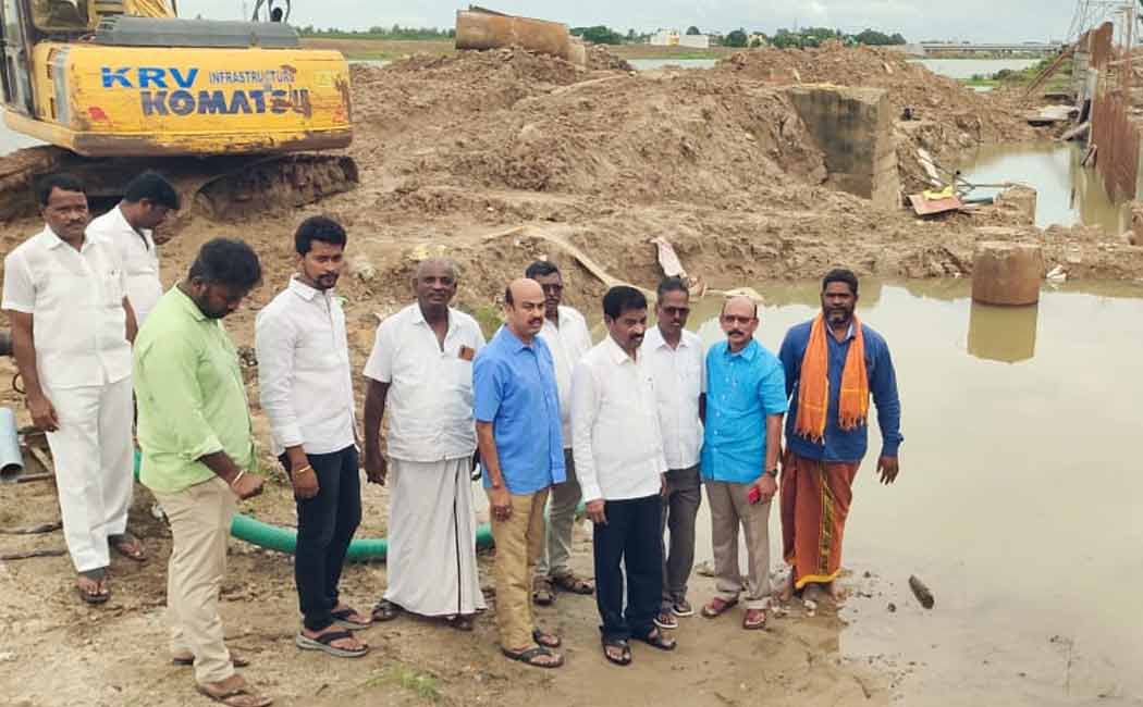 MLA Ayyappan inspects the work of construction of retaining wall in Thenpennai river