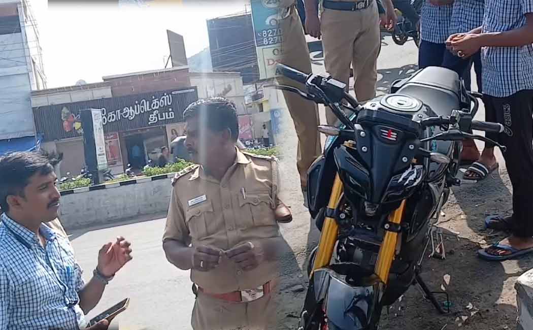 Boy father arrested for driving two-wheeler threateningly