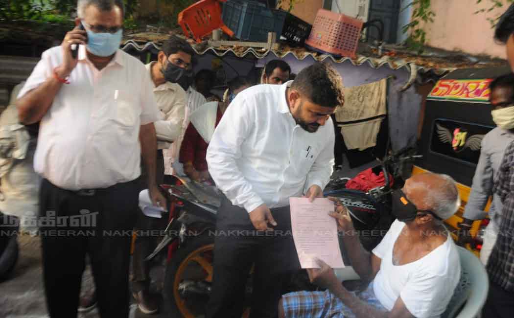 election Officer issuing postal ballot form