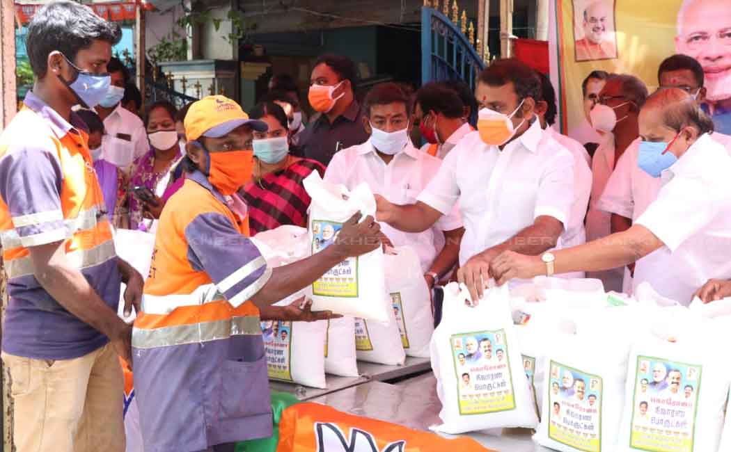 L. Murugan gives 'Modi Kit' to people