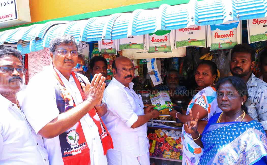 Jayakumar gathers votes by sewing clothes and supporting ADMK candidate (Pictures)