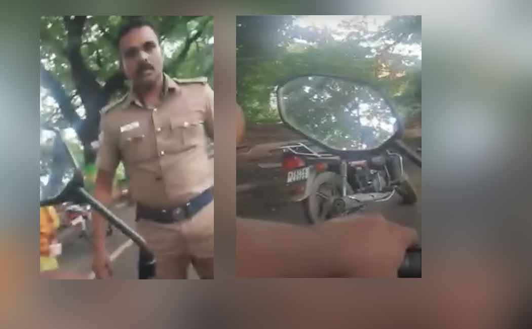 fight between police and youth because of helmet