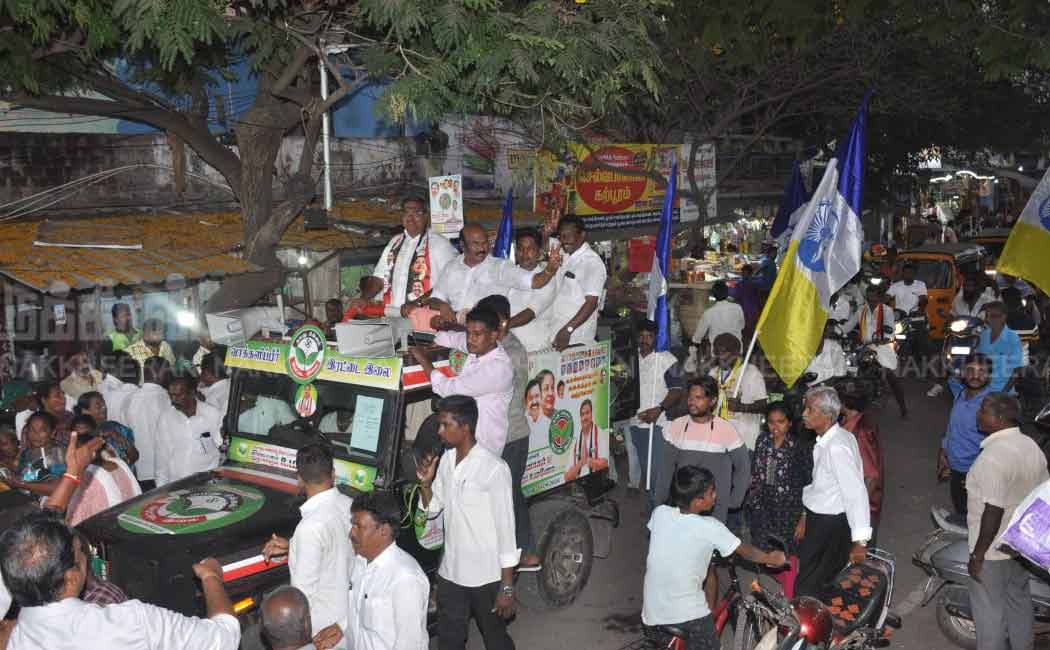 Jayakumar gathers votes by sewing clothes and supporting ADMK candidate (Pictures)