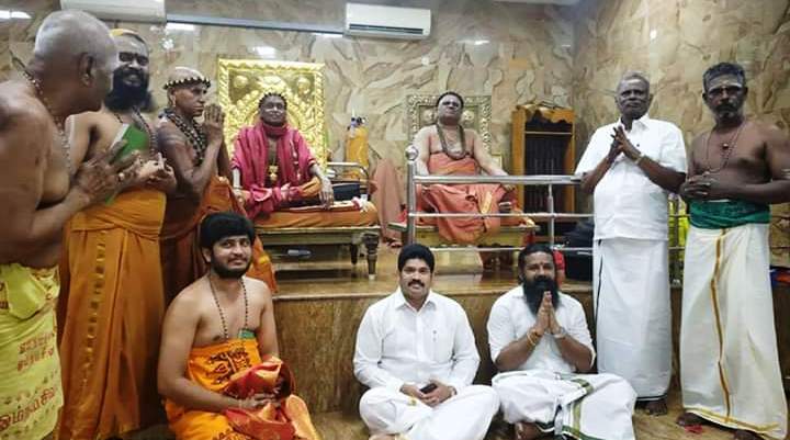Complaint to take action against the person taking the photos with weapon at Atmanadaswamy shrine