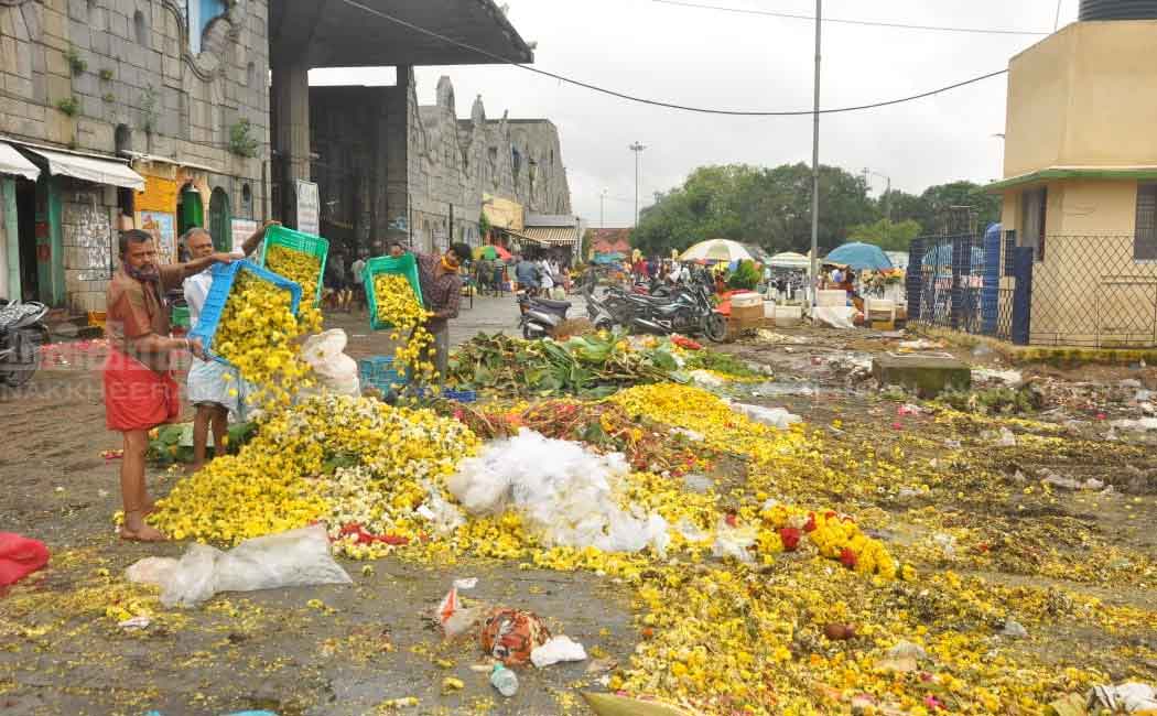 Flowers Traders dumping in the trash