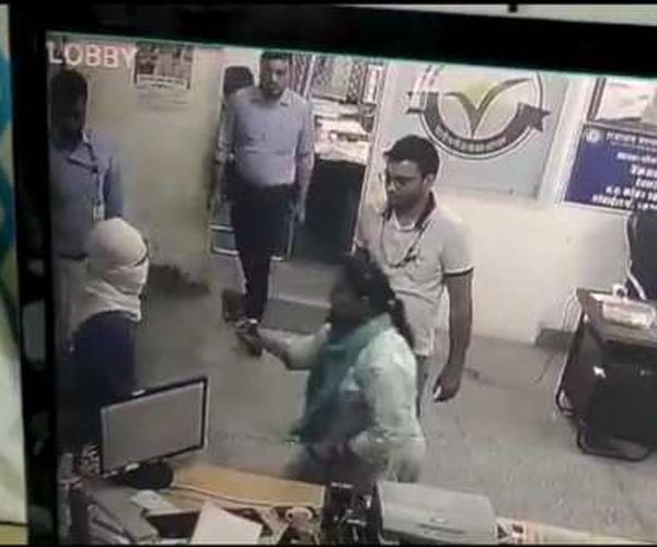 female bank manager bravely wrapped up thief who came rob