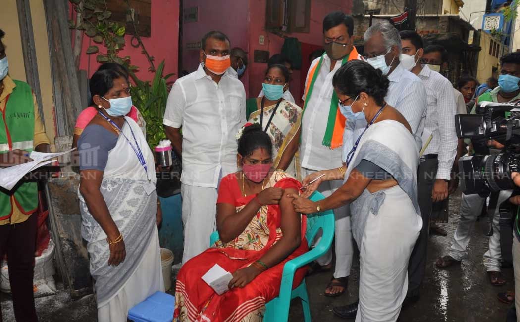 L. Murugan who went door to door campaigning to get vaccinated