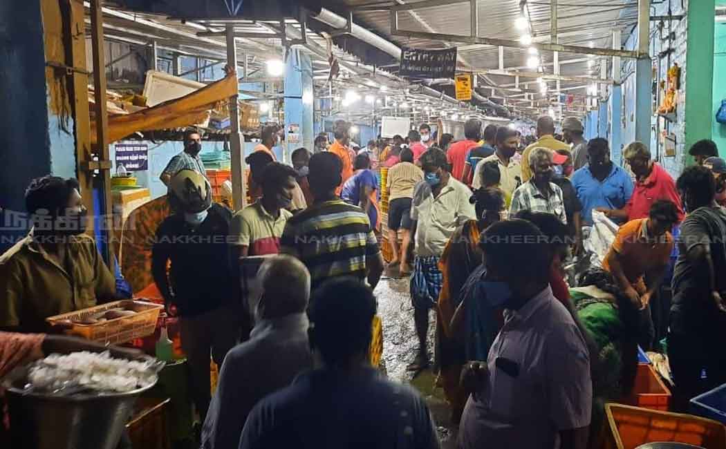 People gathered at the fish market