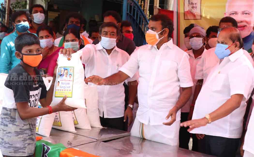 L. Murugan gives 'Modi Kit' to people