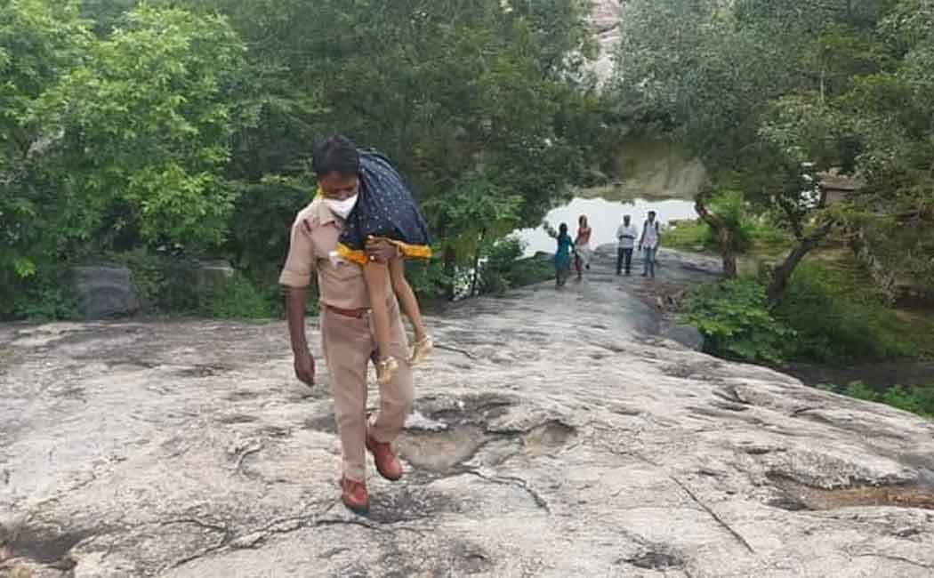 Brother, sister passed away ... Assistant police inspector carrying the body