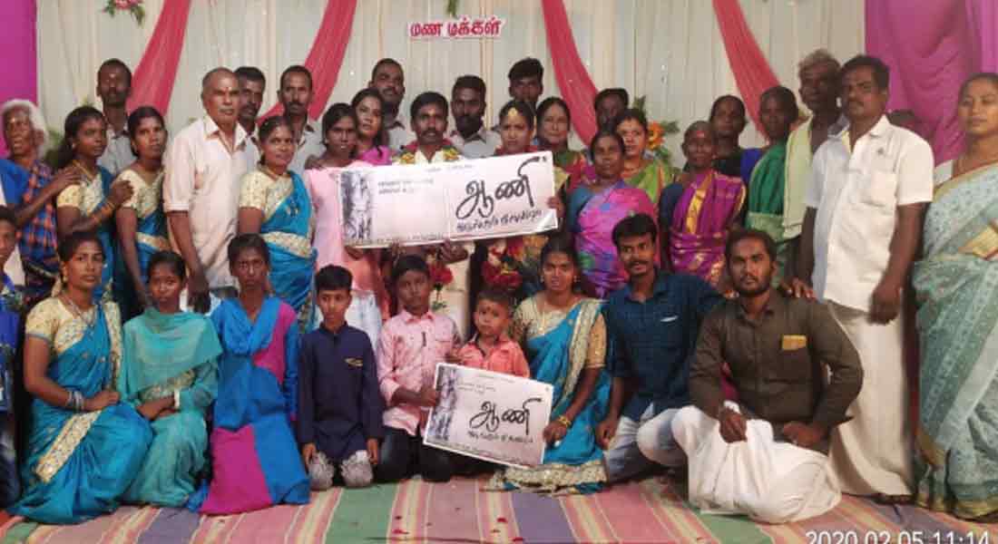 Newlywed couple remove nail in trees