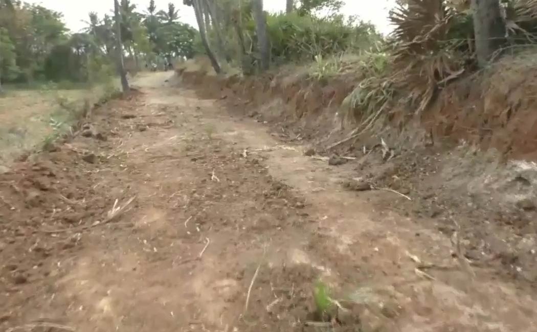 Villagers struggle Action should be taken lake built the road
