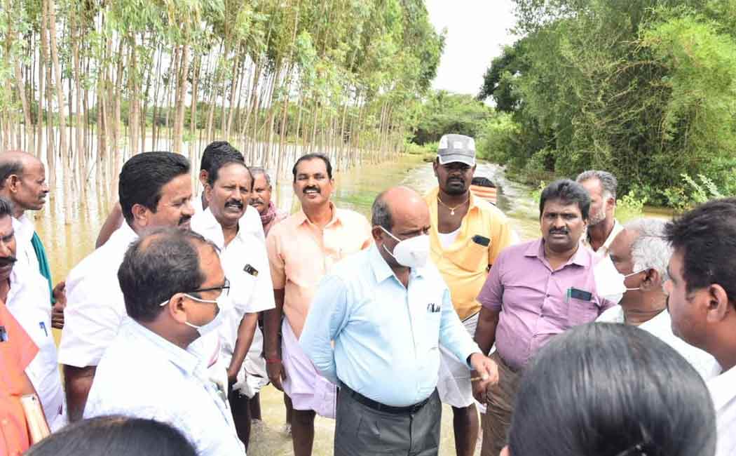 District Collector travels by tractor