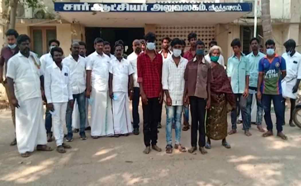 People involved in a road blockade condemning the police