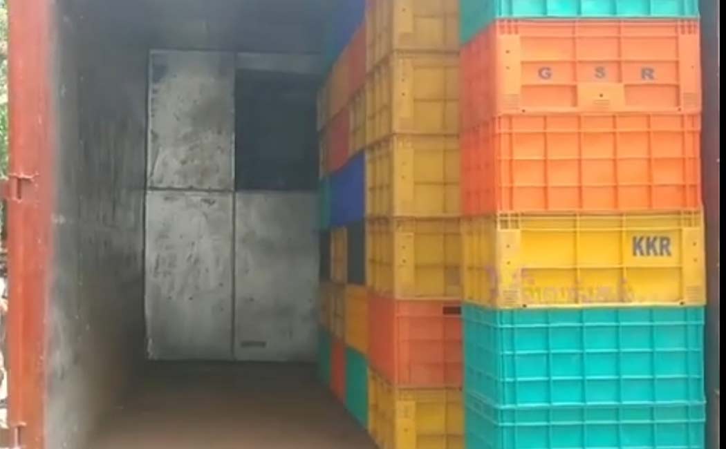 Hoard 105 litres of liquor by keeping a secret room in the container truck