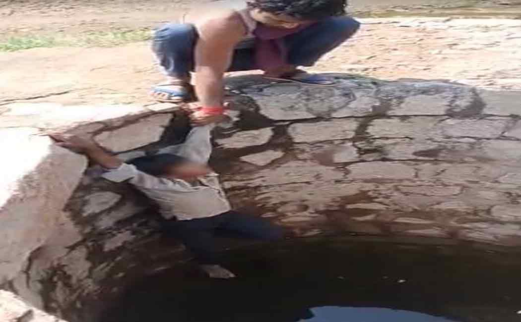 The boy was hanged from a well for stealing a cell phone