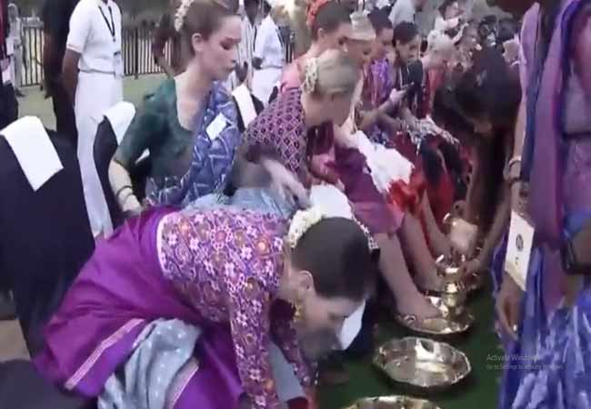 controversy for telangana women wash the feet of Miss World contestants