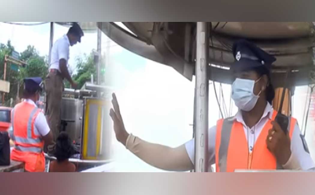 female police officer controlling traffic with a child video going viral