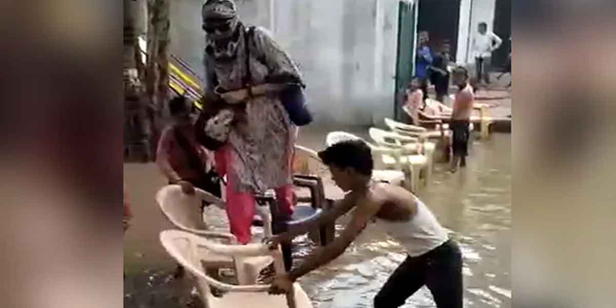 The action of the teacher to prevent rainwater from falling on his feet... Condemnation of Val too!