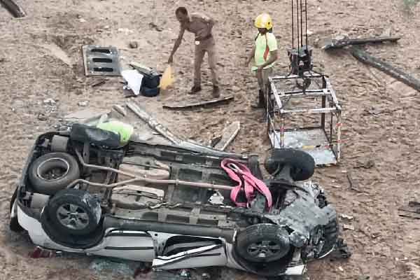 A car overturned in a 50-foot ditch! Two passes away