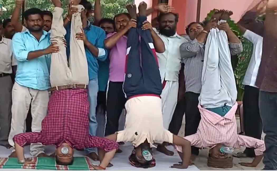 The struggle to stand upside down and drink water;