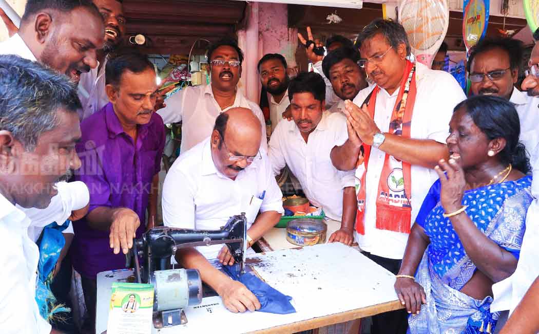 Jayakumar gathers votes by sewing clothes and supporting ADMK candidate (Pictures)