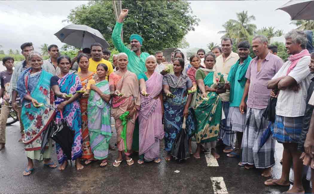 Paddy crops submerged in rain water Farmers involved in road blockade ...!