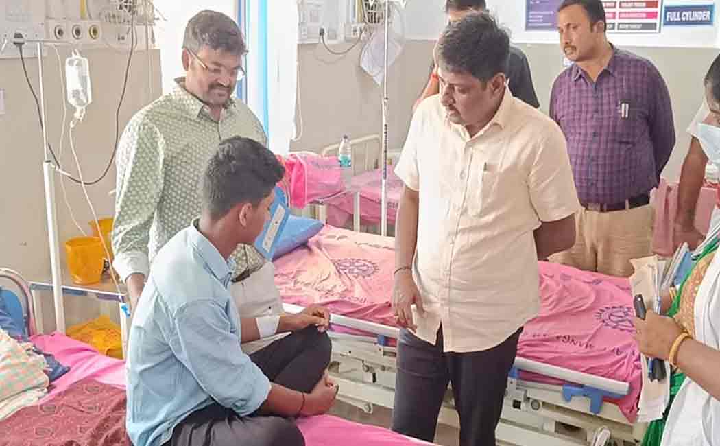 Collector comforts student with low marks in hospital