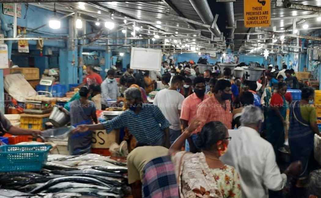 People gathered at the fish market