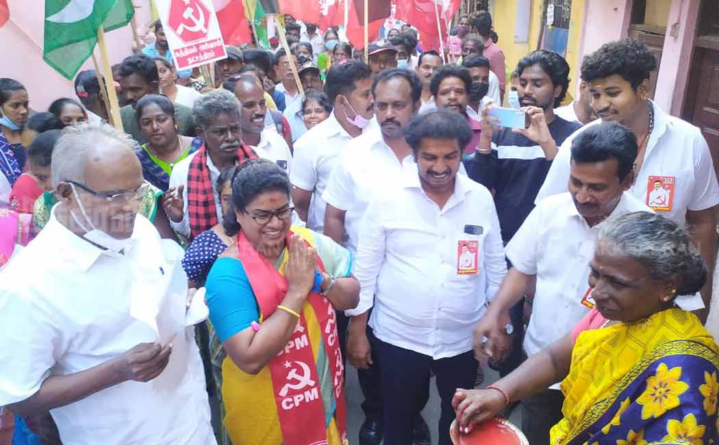 Marxist Communist Party candidate. Balakrishnan collects votes