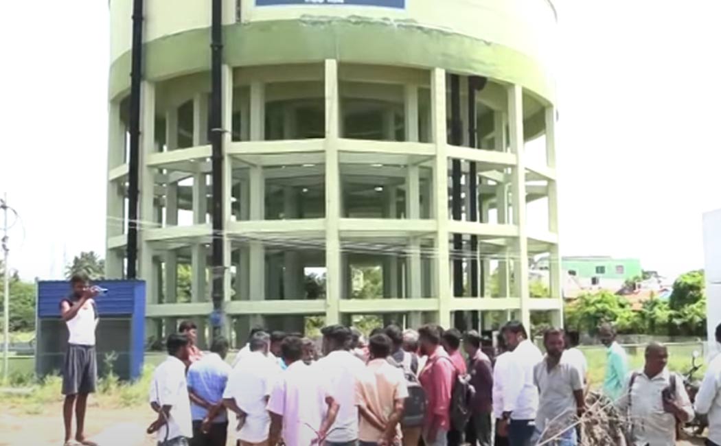 Rumor has it - people gathered in front of the water tank