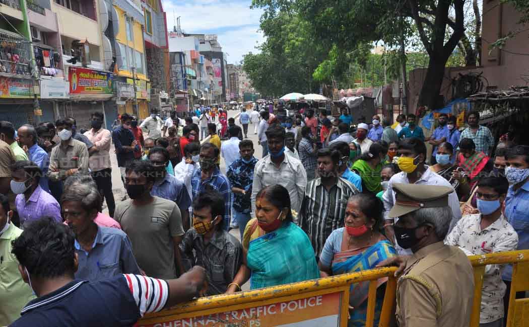 Merchants block the road to open shops