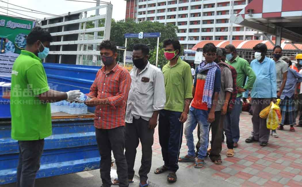 Volunteers feeding outlandish workers