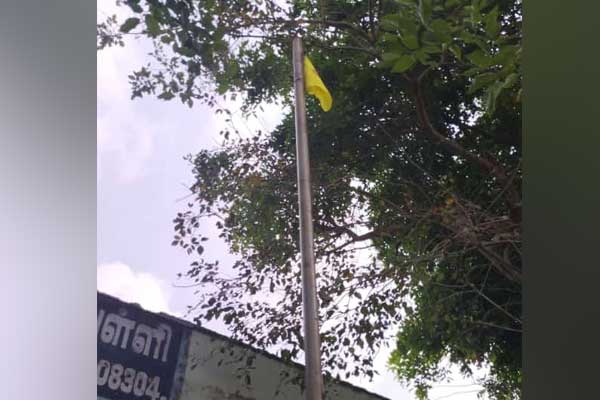 Vanniyar Sangam flag on the national flag pole in Kaattumannarkovil government school