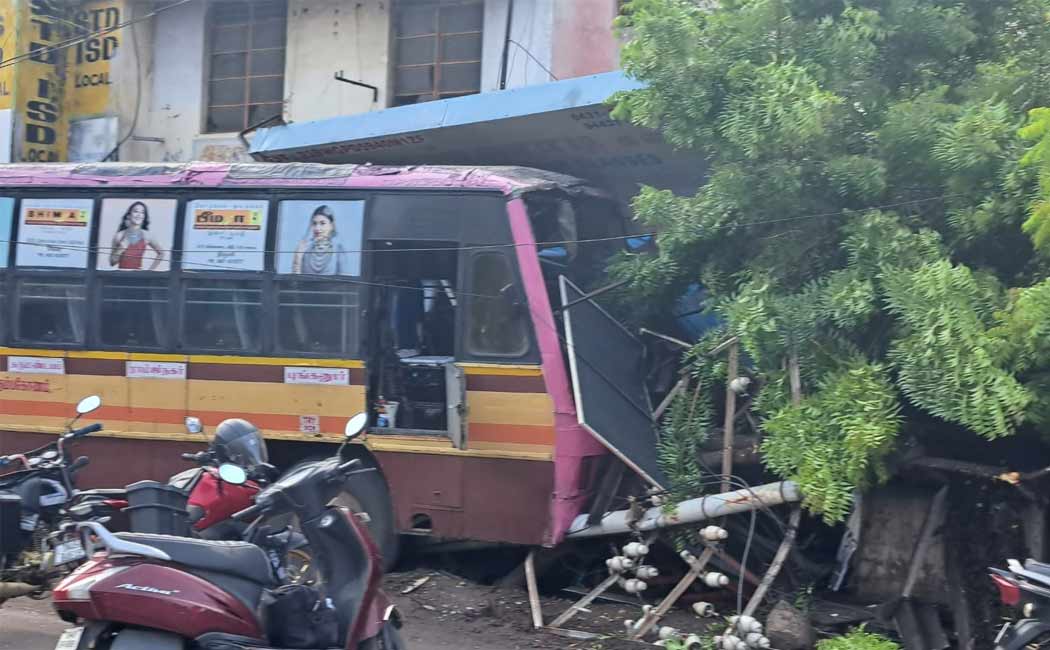 bus crashed into the school as the driver suddenly suffered a heart attack