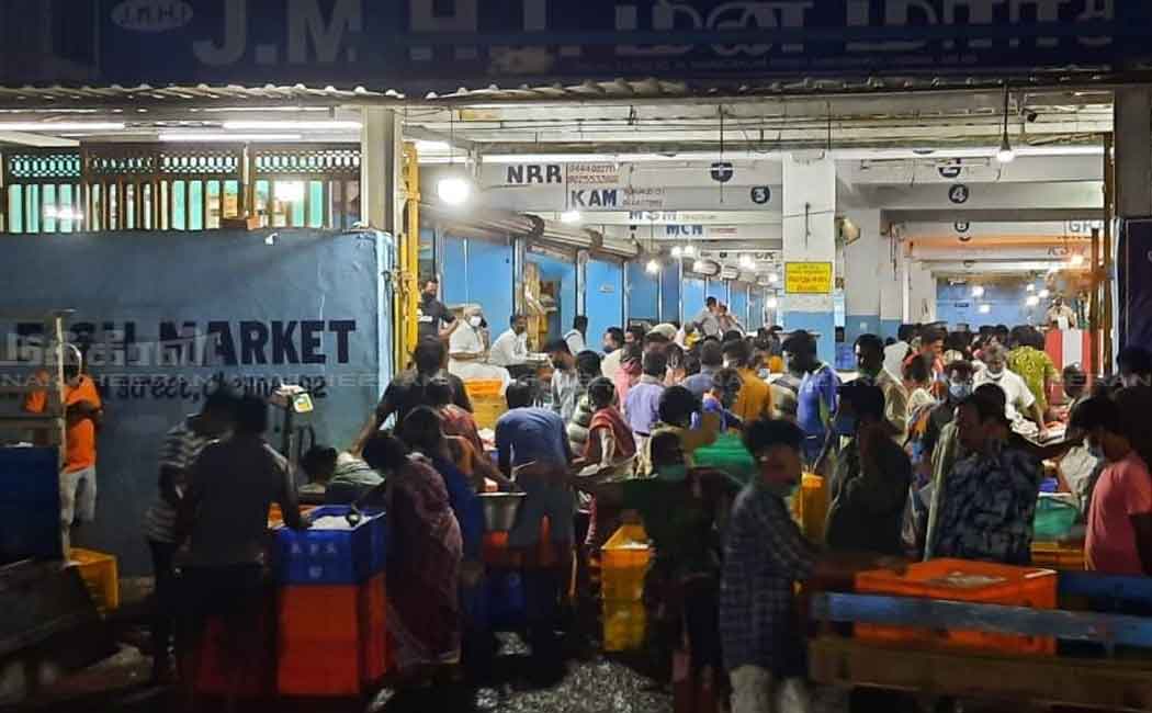 People gathered at the fish market