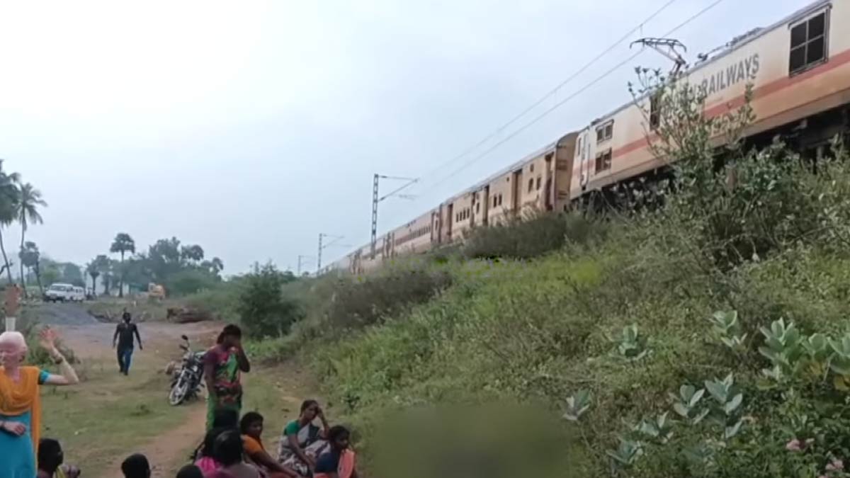 School students trying to cross while playing games on cell phones; Train collision accident
