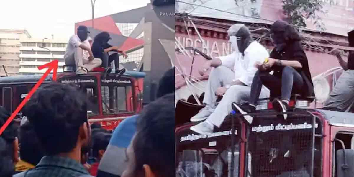 Ajith with a mask on the fire engine... fans gathered