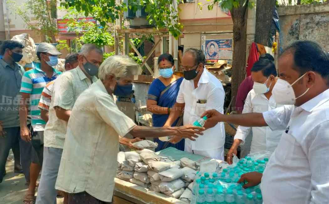 political involved members delivering food parcels