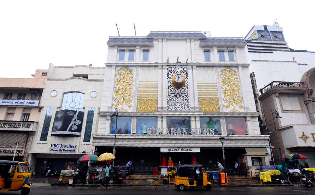 Corporation officials seal the Kumaran Silks shop in Chennai