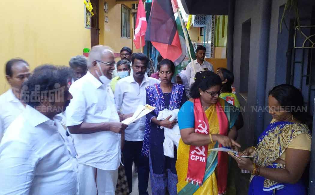 Marxist Communist Party candidate. Balakrishnan collects votes
