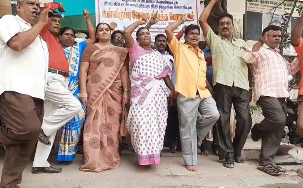 Shack Replacement Board employees standing on one leg protest demanding payment of outstanding wages!