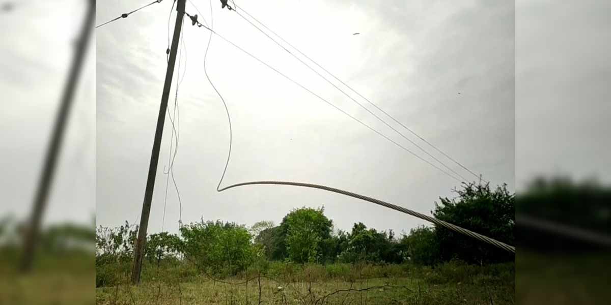 A woman stepping on a downed power line