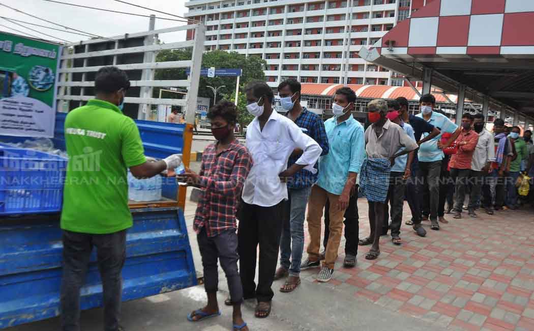 Volunteers feeding outlandish workers