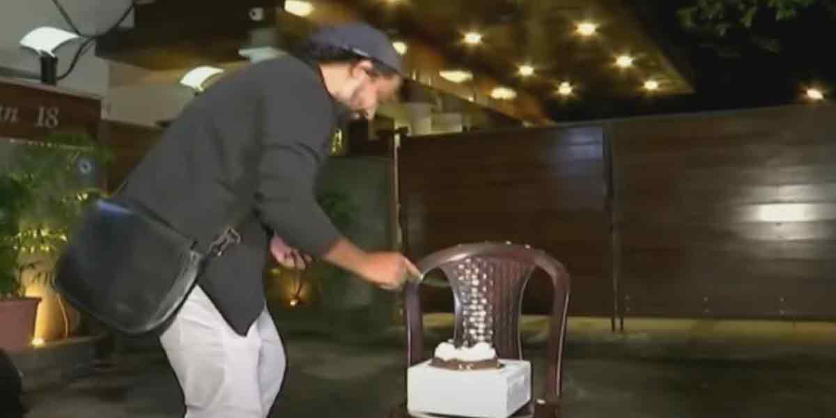 Fans celebrate by cutting the cake in front of Rajini's house!